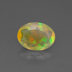 0.82 ct Multicolor Opal Gemstone, Opal Gem in Oval Facet Shape for Sale.