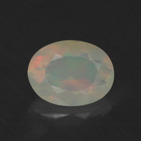 0.64 ct Multicolor Opal Gemstone, Opal Gem in Oval Facet Shape for Sale.