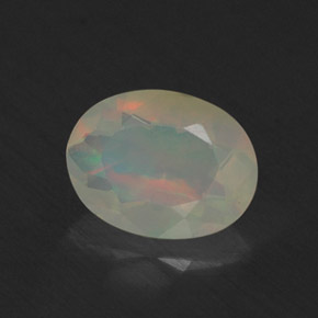 0.64 ct Multicolor Opal Stone, Natural Opal in Oval Facet Shape for Sale