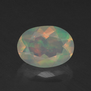 0.76 ct Multicolor Opal Gemstone, Opal Gem in Oval Facet Shape for Sale.