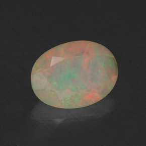 0.66 ct Multicolor Opal Stone, Natural Opal in Oval Facet Shape for Sale