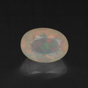 0.87 ct Multicolor Opal Gemstone, Opal Gem in Oval Facet Shape for Sale.