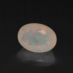 0.87 ct Multicolor Opal Stone, Natural Opal in Oval Facet Shape for Sale