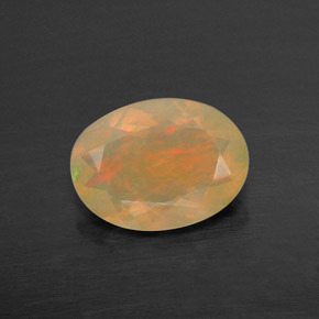 0.67 ct Multicolor Opal Gemstone, Opal Gem in Oval Facet Shape for Sale.
