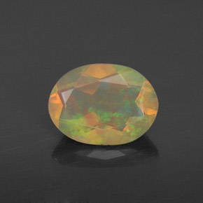 0.66 ct Multicolor Opal Gemstone, Opal Gem in Oval Facet Shape for Sale.