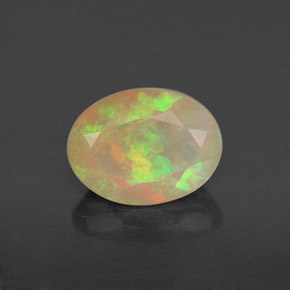 0.82 ct Multicolor Opal Gemstone, Opal Gem in Oval Facet Shape for Sale.