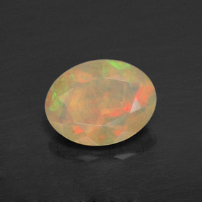 0.72 ct Multicolor Opal Gemstone, Opal Gem in Oval Facet Shape for Sale.