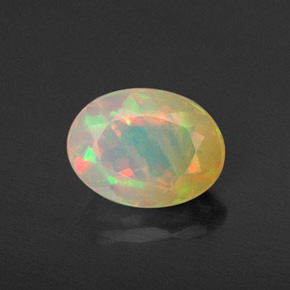 0.87 ct Multicolor Opal Gemstone, Opal Gem in Oval Facet Shape for Sale.