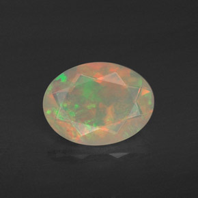0.78 ct Multicolor Opal Gemstone, Opal Gem in Oval Facet Shape for Sale.