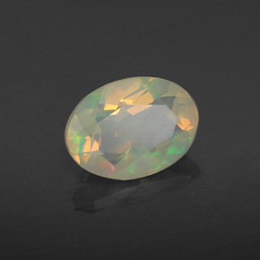 0.67 ct Multicolor Opal Stone, Natural Opal in Oval Facet Shape for Sale