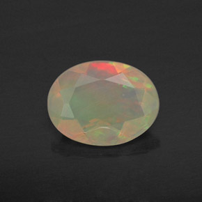 0.69 ct Multicolor Opal Gemstone, Opal Gem in Oval Facet Shape for Sale.
