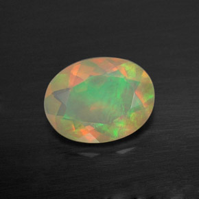 0.73 ct Multicolor Opal Gemstone, Opal Gem in Oval Facet Shape for Sale.