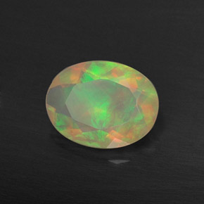 0.73 ct Multicolor Opal Stone, Natural Opal in Oval Facet Shape for Sale