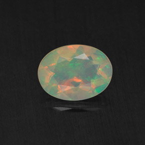 0.65 ct Multicolor Opal Gemstone, Opal Gem in Oval Facet Shape for Sale.