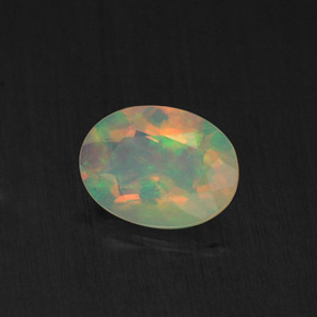 0.65 ct Multicolor Opal Stone, Natural Opal in Oval Facet Shape for Sale