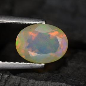 0.88 ct Multicolor Opal Gemstone, Opal Gem in Oval Facet Shape for Sale.