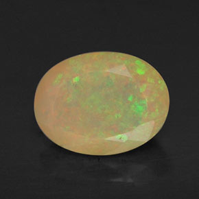 0.87 ct Multicolor Opal Gemstone, Opal Gem in Oval Facet Shape for Sale.