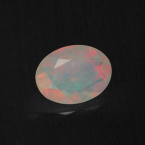 0.77 ct Multicolor Opal Stone, Natural Opal in Oval Facet Shape for Sale