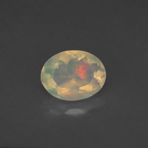 0.77 ct Multicolor Opal Gemstone, Opal Gem in Oval Facet Shape for Sale.