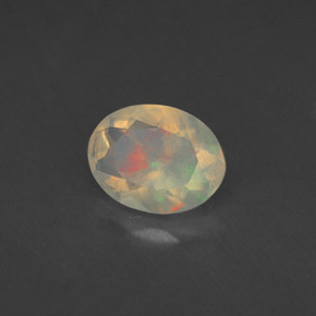 0.77 ct Multicolor Opal Stone, Natural Opal in Oval Facet Shape for Sale