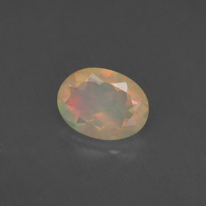 0.75 ct Multicolor Opal Stone, Natural Opal in Oval Facet Shape for Sale