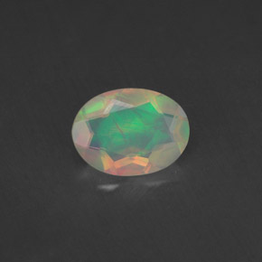 0.65 ct Multicolor Opal Gemstone, Opal Gem in Oval Facet Shape for Sale.