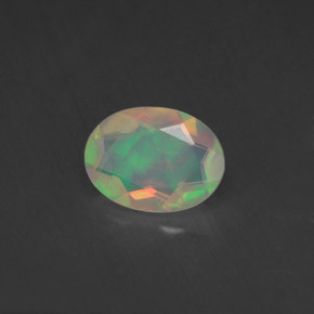 0.65 ct Multicolor Opal Stone, Natural Opal in Oval Facet Shape for Sale
