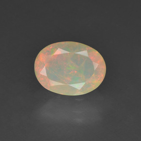 0.63 ct Multicolor Opal Gemstone, Opal Gem in Oval Facet Shape for Sale.