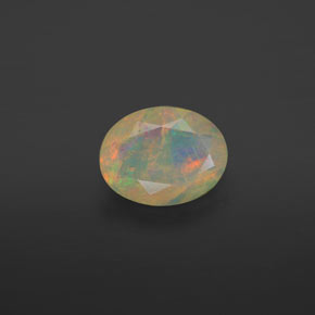 0.63 ct Multicolor Opal Gemstone, Opal Gem in Oval Facet Shape for Sale.