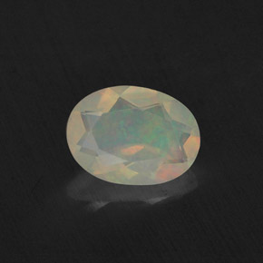 0.65 ct Multicolor Opal Gemstone, Opal Gem in Oval Facet Shape for Sale.