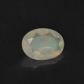 0.65 ct Multicolor Opal Stone, Natural Opal in Oval Facet Shape for Sale