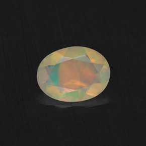 0.62 ct Multicolor Opal Gemstone, Opal Gem in Oval Facet Shape for Sale.