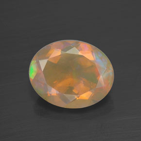 1.73 ct Multicolor Opal Gemstone, Opal Gem in Oval Facet Shape for Sale.