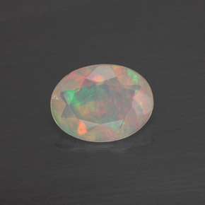 0.70 ct Multicolor Opal Gemstone, Opal Gem in Oval Facet Shape for Sale.