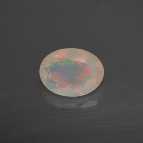 0.83 ct Multicolor Opal Gemstone, Opal Gem in Oval Facet Shape for Sale.