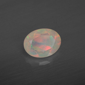 0.83 ct Multicolor Opal Stone, Natural Opal in Oval Facet Shape for Sale