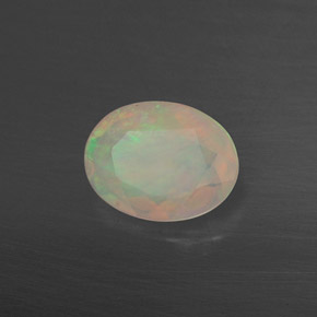 0.65 ct Multicolor Opal Stone, Natural Opal in Oval Facet Shape for Sale