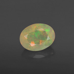 0.84 ct Multicolor Opal Gemstone, Opal Gem in Oval Facet Shape for Sale.