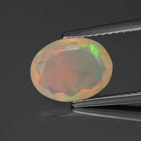 1.36 ct Multicolor Opal Gemstone, Opal Gem in Oval Facet Shape for Sale.