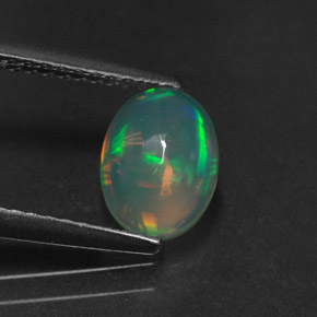 0.92 ct Multicolor Opal Gemstone, Opal Gem in Oval Cabochon Shape for Sale.