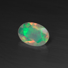 0.44 ct Multicolor Opal Stone, Natural Opal in Oval Facet Shape for Sale