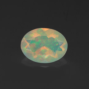 0.91 ct Multicolor Opal Gemstone, Opal Gem in Oval Facet Shape for Sale.