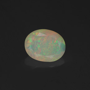 0.98 ct Multicolor Opal Gemstone, Opal Gem in Oval Facet Shape for Sale.