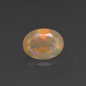 0.88 ct Multicolor Opal Gemstone, Opal Gem in Oval Facet Shape for Sale.