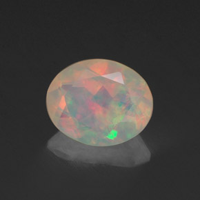0.83 ct Multicolor Opal Stone, Natural Opal in Oval Facet Shape for Sale