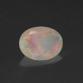 0.64 ct Multicolor Opal Stone, Natural Opal in Oval Facet Shape for Sale
