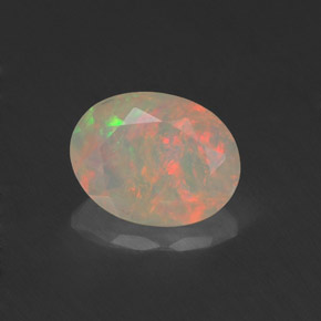0.76 ct Multicolor Opal Gemstone, Opal Gem in Oval Facet Shape for Sale.