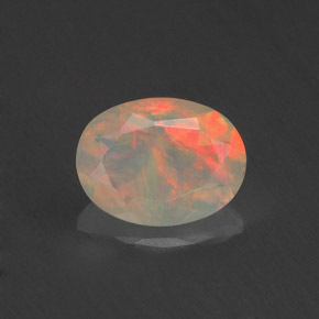0.71 ct Multicolor Opal Gemstone, Opal Gem in Oval Facet Shape for Sale.