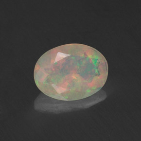 0.74 ct Multicolor Opal Stone, Natural Opal in Oval Facet Shape for Sale