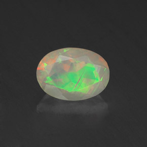 0.67 ct Multicolor Opal Gemstone, Opal Gem in Oval Facet Shape for Sale.